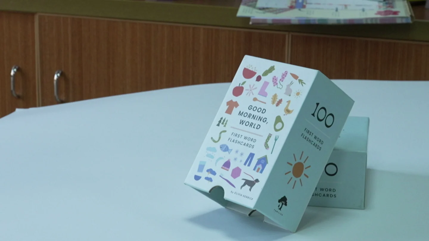 A printed rigid-box sample with its lid displayed beside the base.